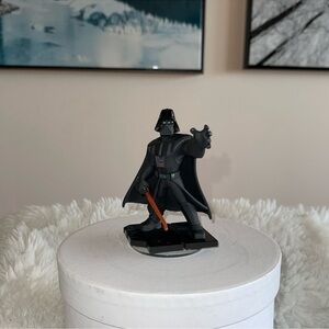 Darth Vader Figure on Blue Car
